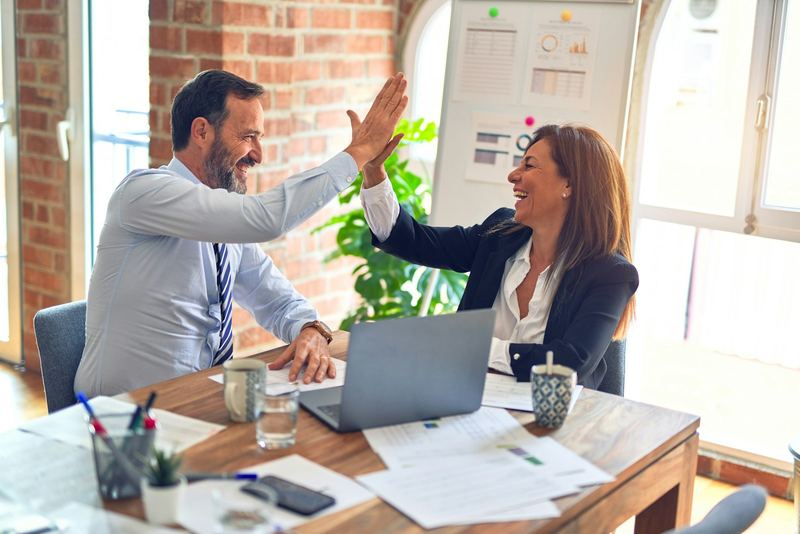 Benefits consultant meeting with business owner